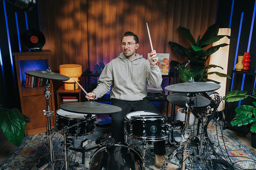 Brandon Toews playing drums