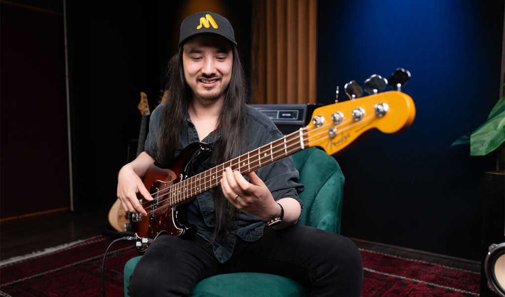 Chris Wong Playing the bass