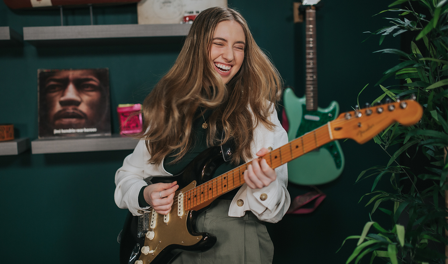 Ayla Playing The Guitar
